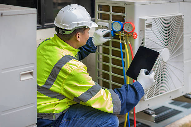 Professional Air Conditioning Repair technician working in Still River, MA